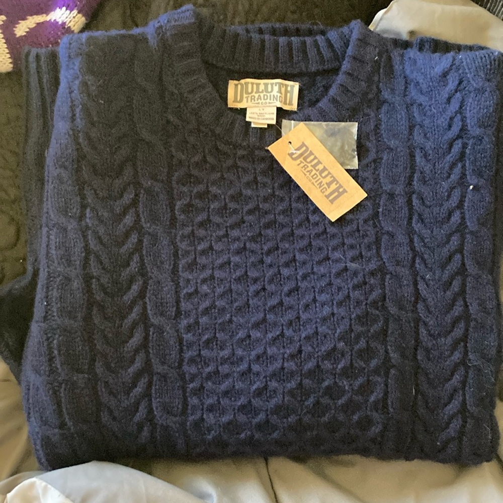 A new with tags LT Duluth Trading Company Navy Blue sweater